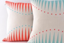 INTERIORS_Butterscotch_Beesting_Circus_Triangles_Red_Cushion_1
