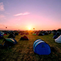 TRAVEL_Wychwood_Festival_campsite_dusk